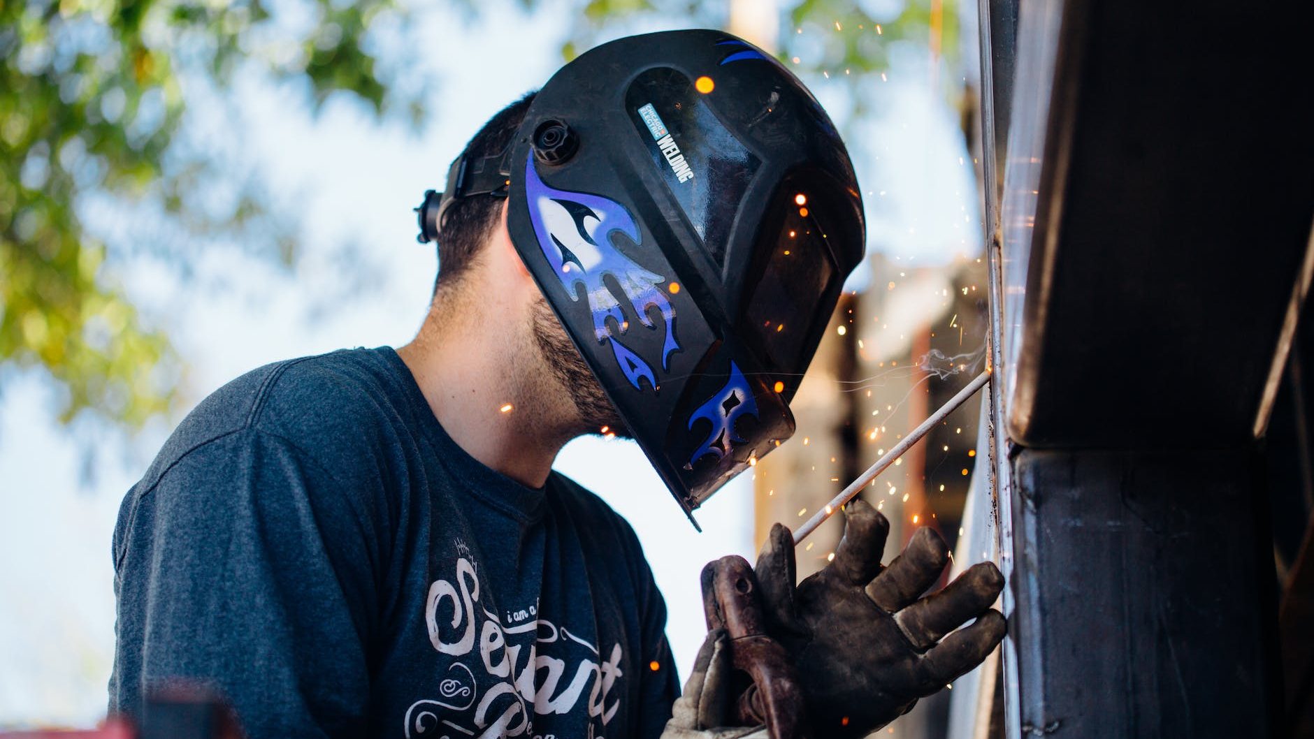 man wearing black welding mask and black shirt